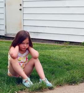 Angry Child in Grass