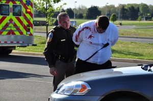 Bloody Man Being Arrested