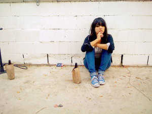 Girl Sitting Drinking Alcohol